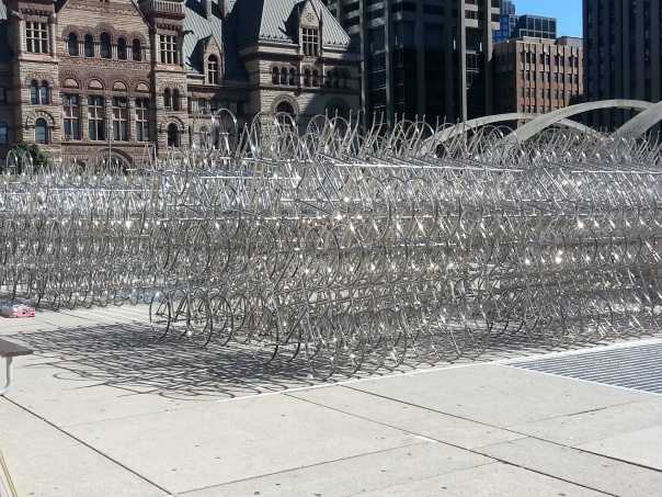 Ai Wei Wei's Forever Bicycles under construction in Nathan Phillips Square for 2013 Nuit Blanche